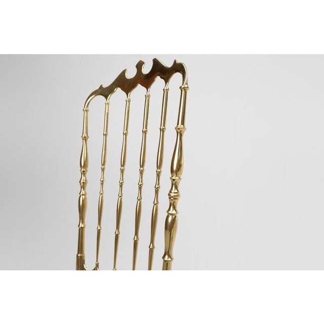 This iconic chair in polished brass with green velvet upholstery was designed by Giuseppe Gaetano Descalzi and produced...