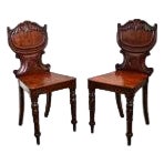 Pair of Early 19th Century English Regency Mahogany Hall Chairs For Sale