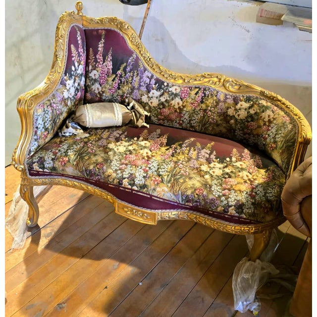 Inspired by the romance of the French countryside, this exquisite Louis XV loveseat settee is a true work of art. Its...