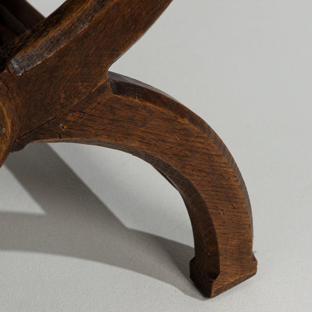 Executed in the grand manner of the English Regency, this curule stool revives the classical X-frame form that has...