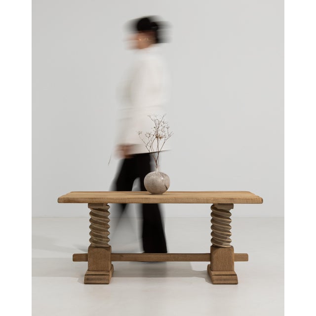 A spirited example of French decorative craft from circa 1970, this oak coffee table commands attention through its...