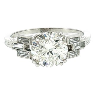 Art Deco Platinum 2.03 Carat Natural Diamond With Straight Baguette Accents For Sale