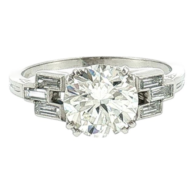 Art Deco Platinum 2.03 Carat Natural Diamond With Straight Baguette Accents For Sale