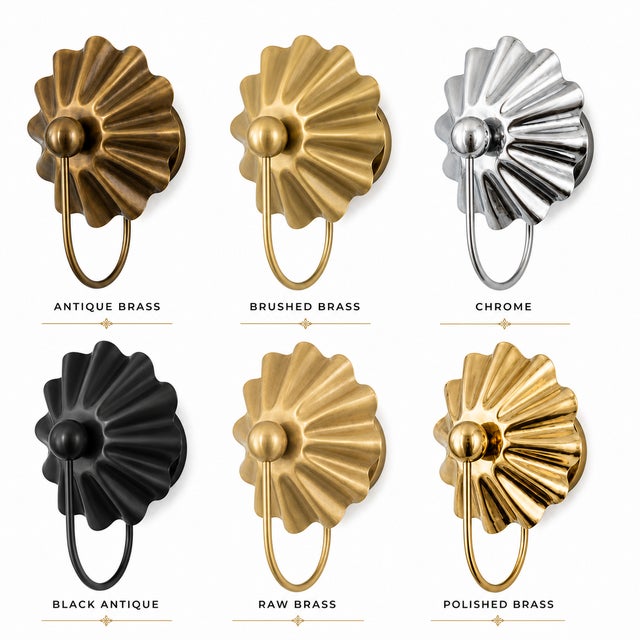 Add a touch of vintage elegance to your home with this stunning Ruffle Shade Wall Sconce, a perfect blend of sculptural...