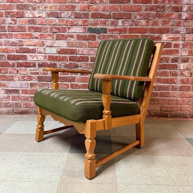 Vintage mid-century Danish armchairs in hand-carved and turned quarter-sawn white oak attributed to Henning Kjærnulf,...