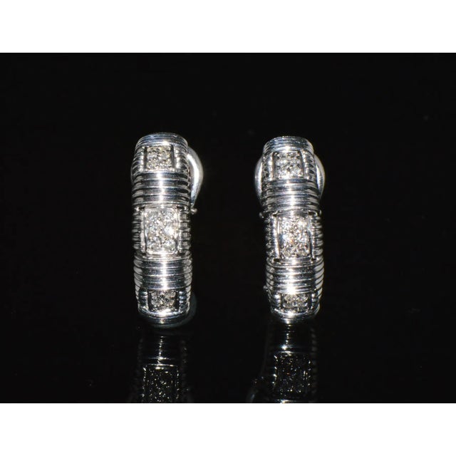 Authentic Roberto Coin diamond Appassionata 18K White Gold Huggie half Hoop Earrings. These fabulous earrings feature a...