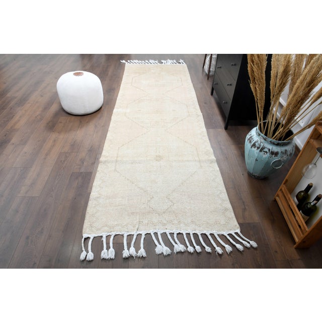 Vintage Hand-Knotted area rug is a semi-antique vintage area rug. The '70s Eastern region of Anatolian's unique rug is...