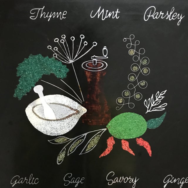 This is a Couroc resin tray that features an inlaid design of a pepper mill, mortar and pestle, herbs and spices. The...