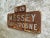 Vintage place name sign from the French Messey-sur-Grosne. This metal sign contains aluminum riveted letters. This place...