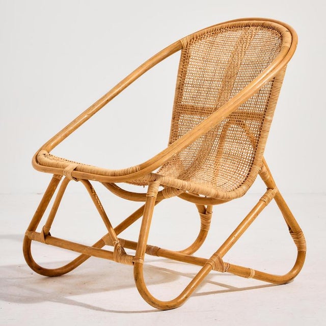 Italian bamboo chair from the 1960s. The frame of the chair is made of bamboo, the seat and backrest are made of woven...