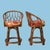 A stylish set of three bent rattan stools, perfect as extra seating or chic accent pieces. Their gracefully curved frames...