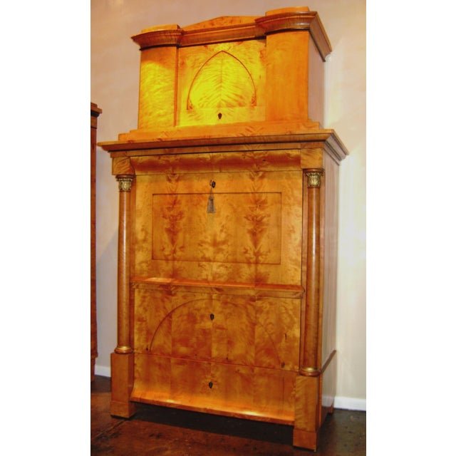 Stately two piece Secretary writing and storage desk and cabinet from the Biedermeier Era circa 1860's from Southern...