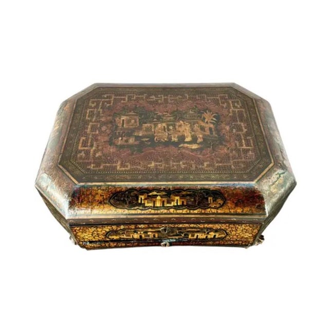 19th Century Chinoiserie Sewing Box. Octagonal shaped box is hand-painted with intricate gilt decorated depicting Asian...