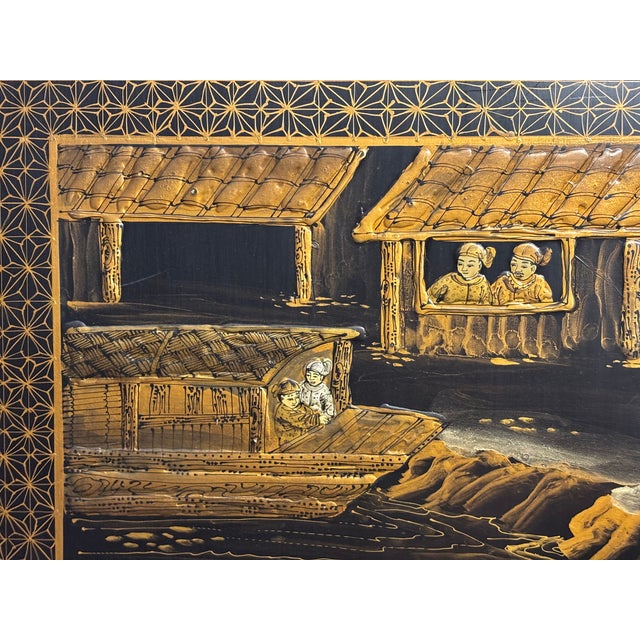 A mid 20th Century Chinoiserie decorated room divider screen with six panels. The black lacquer finish is decorated in...