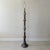 This is a one-of-a-kind floor lamp made up of 13 distinct pottery pieces arranged on a single stem. Each piece features...