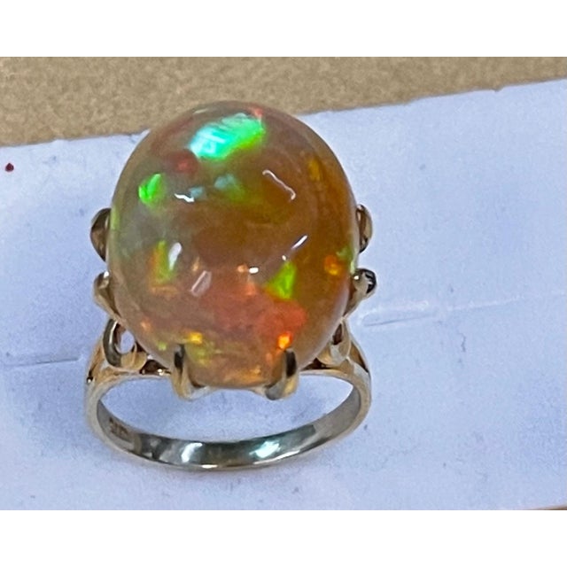 White 12 Carat Oval Shape Ethiopian Opal Cocktail Ring 14 Karat Yellow Gold For Sale - Image 8 of 18