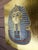 Gorgeous handcrafted relief of the golden death mask of the pharaoh tutankhamun and hieroglyphs names , exquisite ancient...