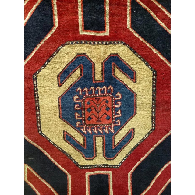 This striking vintage wide runner from Northwest Persia, dating to the third quarter of the 20th century, exemplifies the...