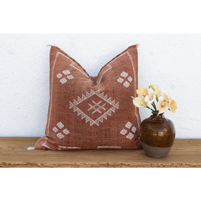 Woven from the resilient fibers of the Saharan aloe vera cactus — often called cactus silk or Sabra silk — this large...