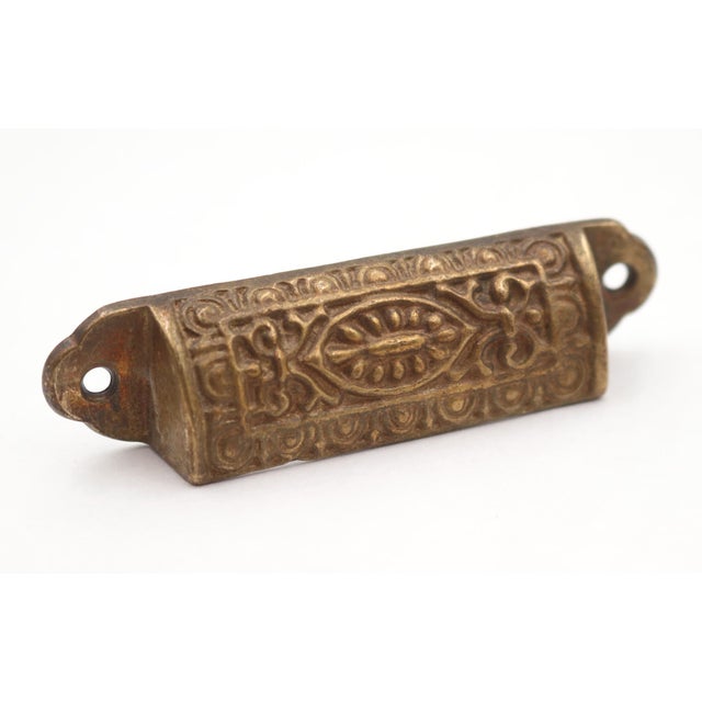 Antique Victorian style bin drawer pulls made of bronze with a patina finish. The original mounting screws are not...