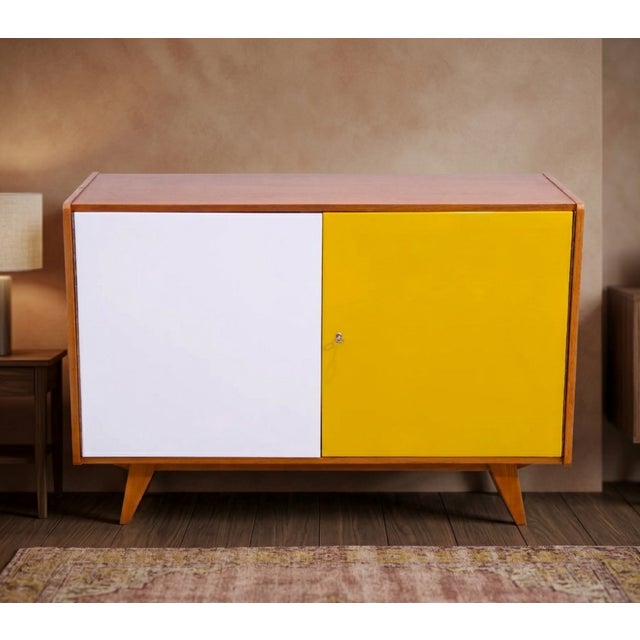 Mid century sideboard-cabinet, catalogue no. U-450, designed by jiri jiroutek. It´s made of beechwood, veneer, plywood and...
