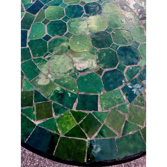 Add a pop of color and handcrafted charm to your home or patio with this beautiful tamegroute green mosaic accent table....