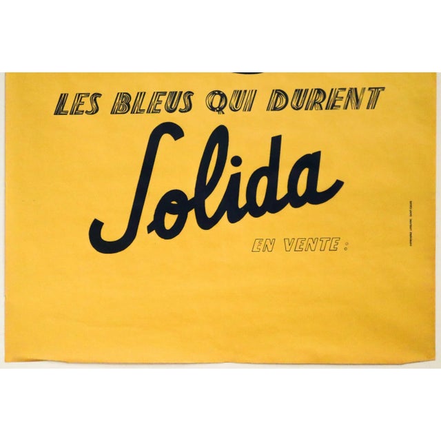 Art Deco 1940's French Men's Fashion Advertisement, Solida “Les Bleus Qui Durent” For Sale - Image 3 of 3
