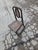 This is an antique dark brown wooden Victorian-style rocking chair featuring a woven cane seat and back. Some slight wear,...