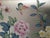 Elegant hand painted silver foil wallpaper sample featuring delicate flowers, botanical branches, and a graceful butterfly...