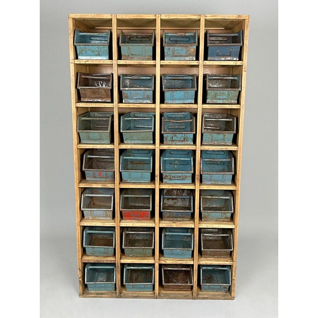 Unique vintage industrial wooden shelf cabinet with metal drawers saved from a screw factory. This piece will add that now...