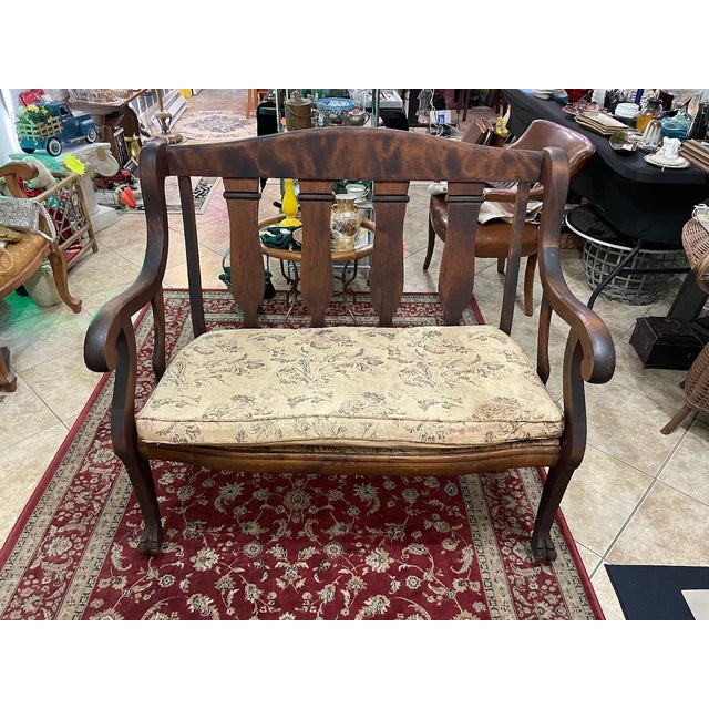 This beautiful Swedish-made bench showcases elegant curves and intricate craftsmanship. Featuring a solid wood frame with...