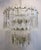 A stunning Italian crystal and brass chandelier by designer Gaetano Sciolari, circa mid-20th century, 1960s, Italy....
