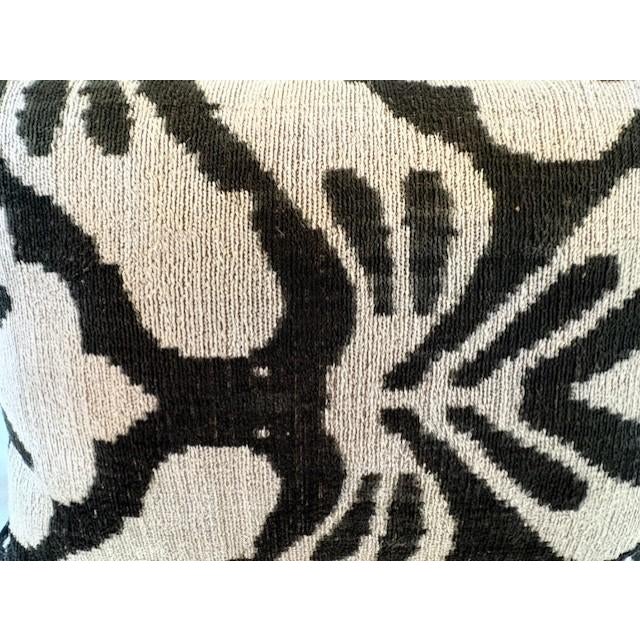 This charming pillow case from Les Ottomans features a darling foliate pattern on a soft silk velvet on the front. The...