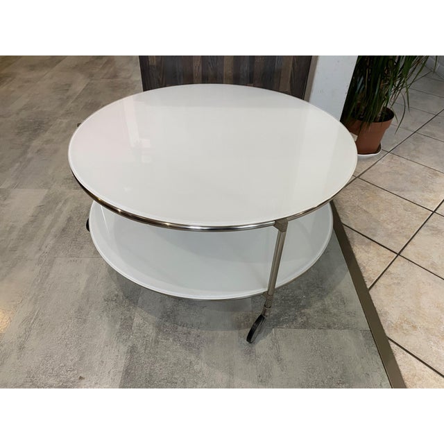 2 identical tables available for sale, The price is for a single table Coffee table with double tops in white opaline...
