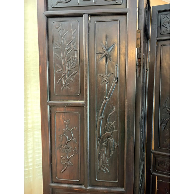Beautifully hand-carved Antique Rosewood Screen/Room Divider. Carvings of figurines, flora and symbols. Different carvings...