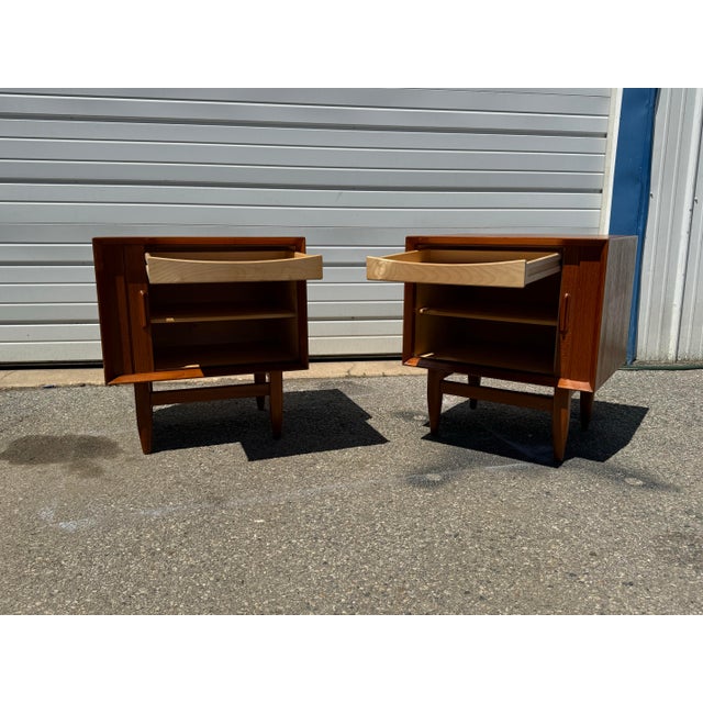 Pair of Danish Modern Sven Age Madsen Tambour Door Teak Nightstands Offered is a piece of time and design: a Pair of Mid-...