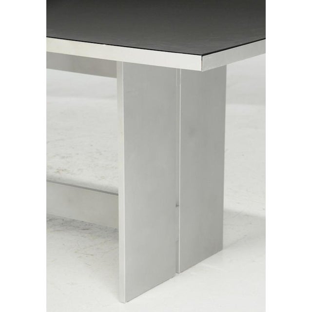 circa 1998, Richard Gluckman (American, b. 1947), unmarked, aluminum trestle form base, black frosted glass top, 29-1/2 x...