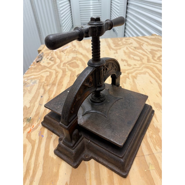 Heavy wrought iron book press. In working order. Great conversation piece. Purchased in Germany but I believe it is French.