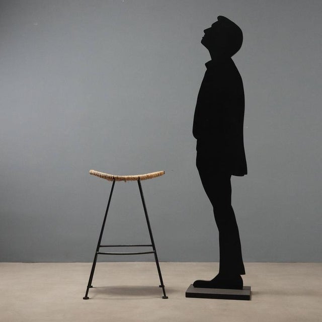 Banana' model stool designed in the 1980s by Tom Dixon for Cappellini production. The structure features black enamelled...