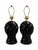 A dramatic pair of vintage black ceramic table lamps featuring deeply sculpted, sweeping leaf-like forms and a high-gloss...