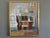 INTERIOR WITH DESK Size: 25 x 21.9 inches cm (including frame) Oil on canvas A warm and inviting mid-century painting that...