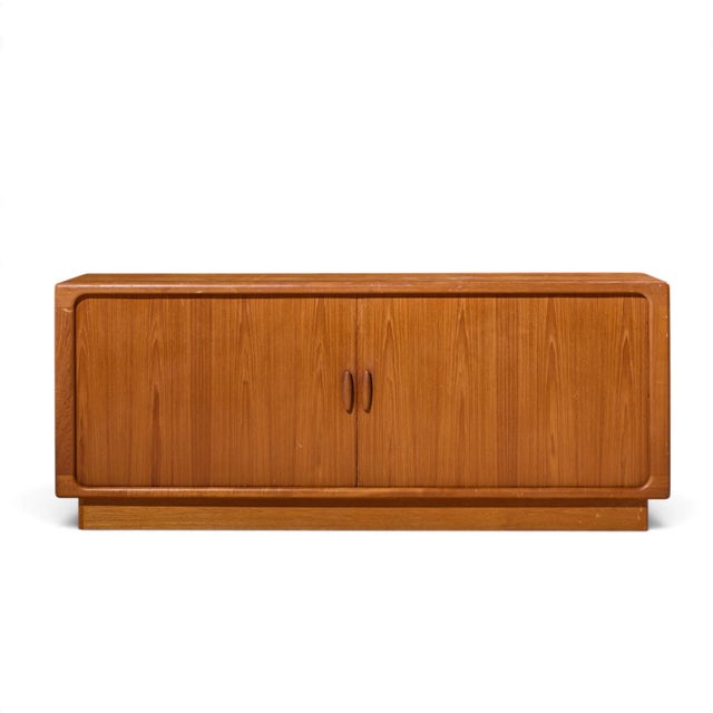 Dyrlund Mid Century Danish Teak Tambour Door Credenza This credenza measures: 74.75 wide x 19.25 deep x 30.25 inches high...