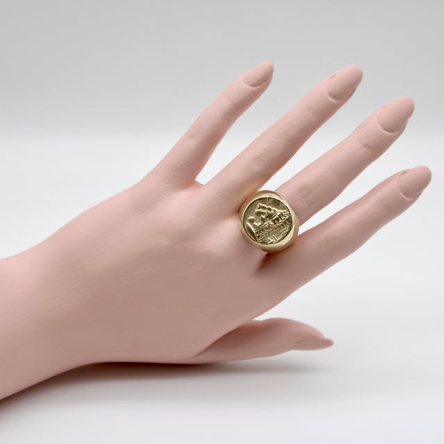 This ring is a 14k gold version of the image of the lion found on the Greek Cyzikos coin that dates to 4th century BC. The...