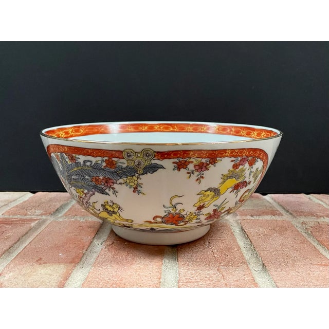 Hand painted porcelain bowl from Hong Kong in the ‘Chien Jardin’ pattern. Medallions of playful foo dogs & flora circle...