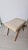 Ottoman in Light Wood with Eco-Leather Upholstery, 1950s, in Good conditions. Designed 1950 to 1959