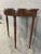 Antique Sheraton Style Demilune Console Table with beautiful mahogany veneer and contrasting inlaid banding detail. This...