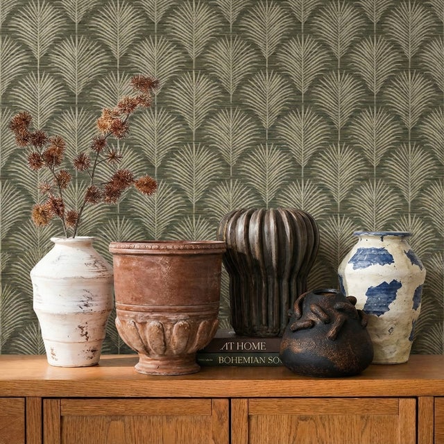 This terracotta vase from TOV brings warmth and organic charm to any space. Each piece is hand-finished, letting the...
