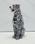 Unique handmade statue of a white leopard. This Hollywood Regency statue, crafted from hand-painted ceramic and made in...