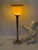 Beautiful French Art Deco style table lamp. The lamp dates from the late 1980s. Over time, it has developed a beautiful...