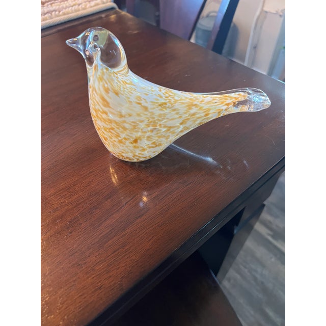 Murano Style Bird in a Yellow Speckled Color and can be used as a Paperweight .